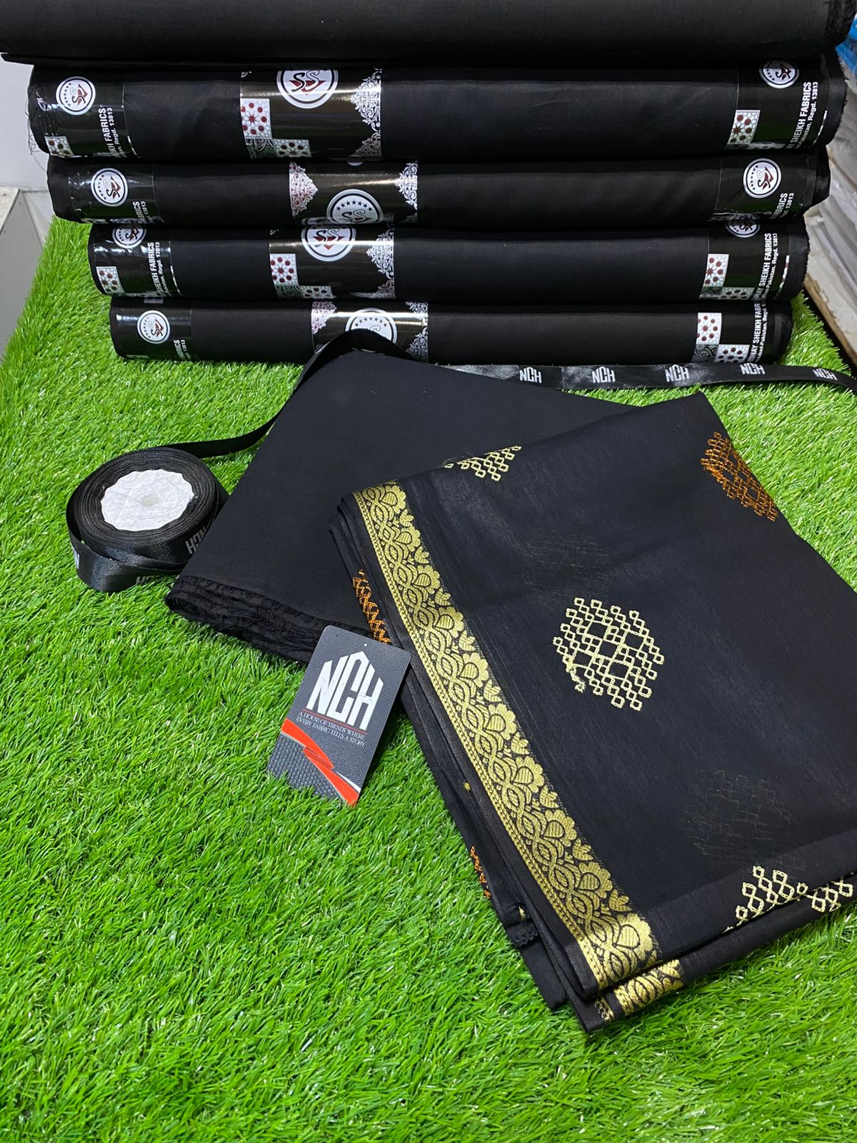 Black suits and shawls